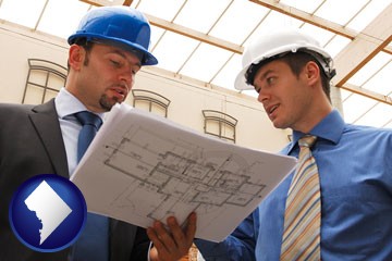 two architects reviewing blueprints - with Washington, DC icon